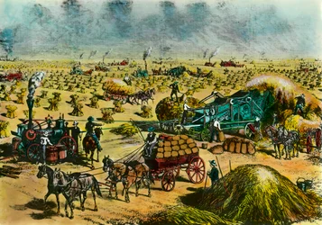 Agricultural revolution: wheat harvest in Dakota by steam machines in the 19th century. Engraving of the 19th century. Paris, Museum of Decorative Arts