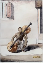 Indian culture, civilization and society: musician with traditional Indian string instrument. Engraving from 1808.