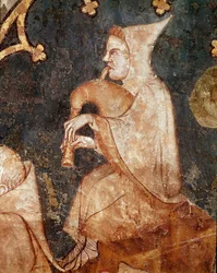 Shepherd Blowing in a Bagpipe. Detail. 14th century fresco. From Olite (Navarre). Museum of Navarre, Pamplona