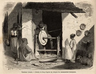 The Artisan Turner Kabyle in his workshop makes a huge wooden flat that is used for all purposes, domestic and agricultural, in Kabylia (Algeria). Engraving to illustrate the excursion to the great Kabylie, between the Mediterranean and the Djurjura, in 18