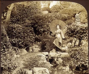 Japanese kimono umbrella in a garden - photography, late 19th century