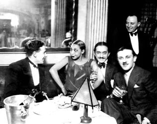 Josephine Baker with Georges Simenon and her fiance Guiseppe Abatino, Restaurant Chez Josephine, c.1928