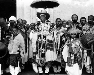 King Menelik II (1844 - 1913) surrounded by his court. Ethiopia.