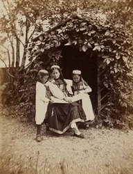 La Foret Noire: Portrait of a Woman with Two Children in Traditional Dress of the Black Forest