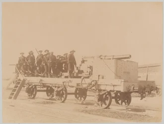 Sailors from HMS Hecla manning a naval gun mounted on railway flat wagon, Egypt