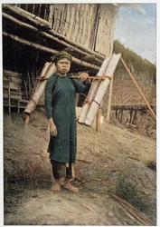 Water carrier in Tonkin, Vietnam, circa 1898 - photography