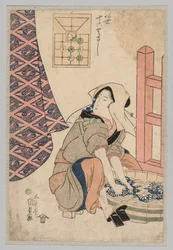Seated Woman Washing Clothes in a Wooden Tub