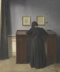 Ida Standing at a Desk