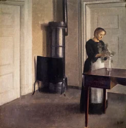 Interior with a Woman Arranging Flowers in a Vase