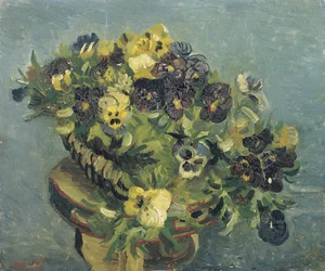 Basket of pansies on a small table