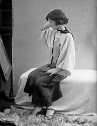 Model wearing a dress created by Anita Pittoni, c.1940