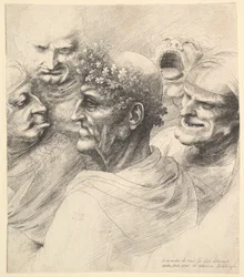 Five grotesque heads, including an elderly man with an oak leaf wreath