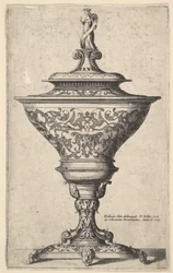Ornate Goblet on Feet of Masks