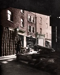 Fruit Baskets Piled Against Houses at Borough Market, London, 1926-1927