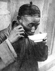 A man eating, Mukden Shenyang, China, 1936