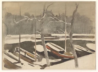 Moored boats on a snow-covered canal