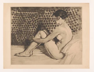 Naked young woman with her arms around her knees. Nude, seated on a divan with knees drawn up