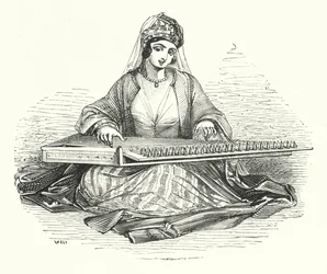 Lady playing on the Kanoon