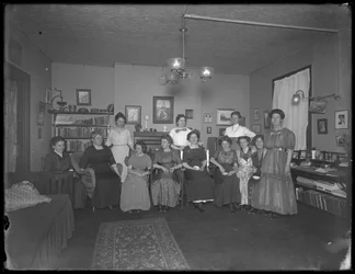 Harriet E. Hassler with a group of young women, 206 W. 13th Street