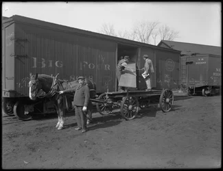 Men Measuring and Inspecting Lumber for Use in Casket Manufacture, Oneida, New York