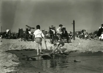 Two Children Play with Wood Scraps in Shallows, Coney Island, c.1910-21