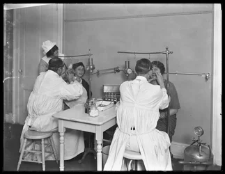 Two patients being examined, Examining room #2, Seton Hospital, Spuyten Duyvil, Bronx, October 30, 1914