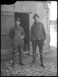 Unidentified Sewer Workers Pose Above Ground, New York