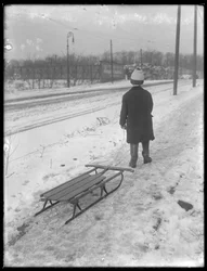 William Gray Hassler with his new sled, c.1912