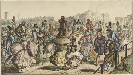 Men and Women in Striking Attire Walking in a Park in a City