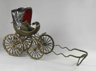 A painted and gilded baby carriage