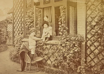 Children Playing at a Window
