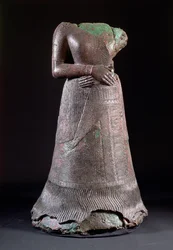 Statue of Queen Napirasu, wife of Untash-Napirisha, an Elamite king of the 12th century BC, found at Susa, Iran, c.1250 BC