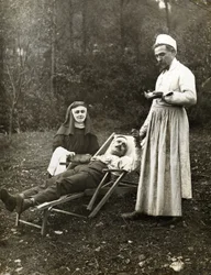 Doctor Taking the Pulse of an Injured Man, Assisted by a Nurse Nun