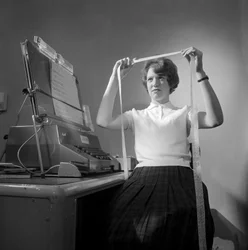 Model 803 Computer: Woman Engineer Working on Tape Rectification