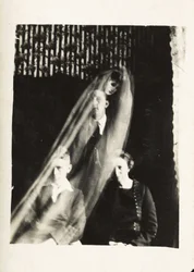 Paranormal Phenomenon: Portrait of a Woman and Two Men, and the Spirit of a Woman Appearing Behind Them