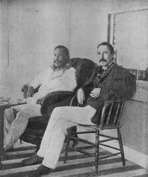 Robert Louis Stevenson with King Kalakaua of Hawaii on the Verandah of the Royal Boat House at Honolulu