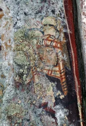 Male figure with headwear, damaged fresco in church of Metamorphosis Sotiros, Voutas, Crete, Greece